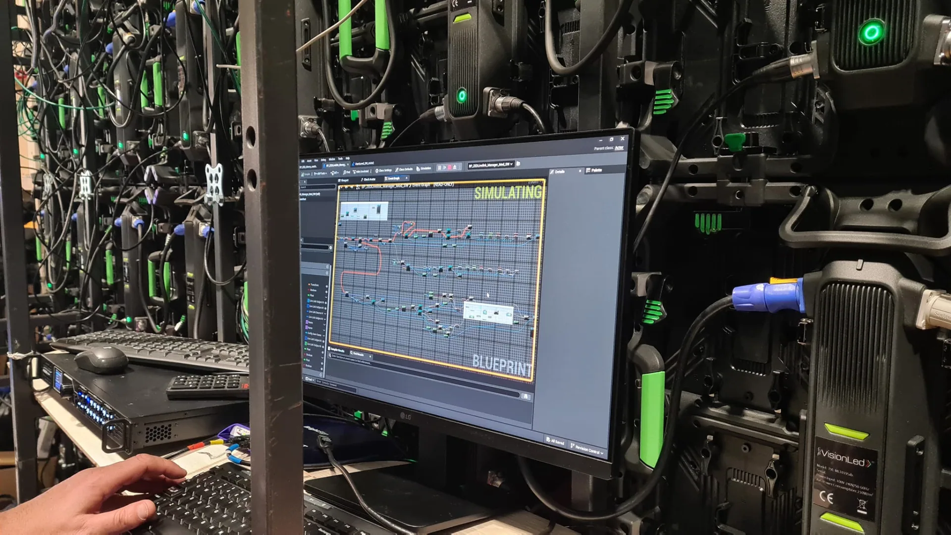 Backstage rack and control laptop running the real-time simulation.