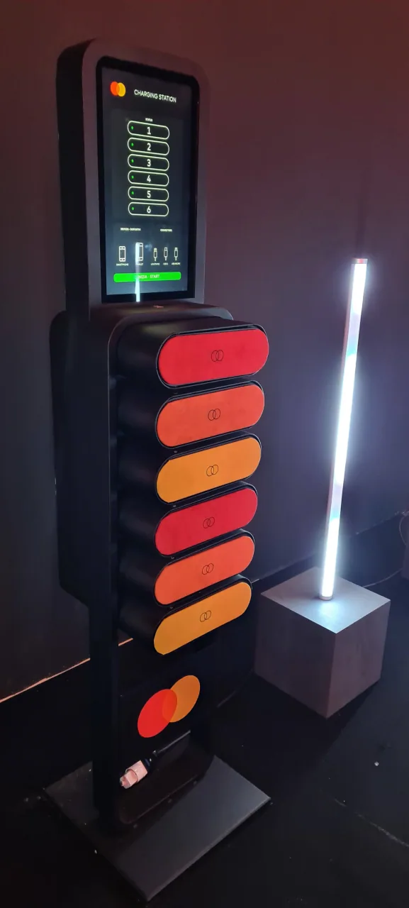 One of the totems: vertical touchscreen above a custom illuminated base.