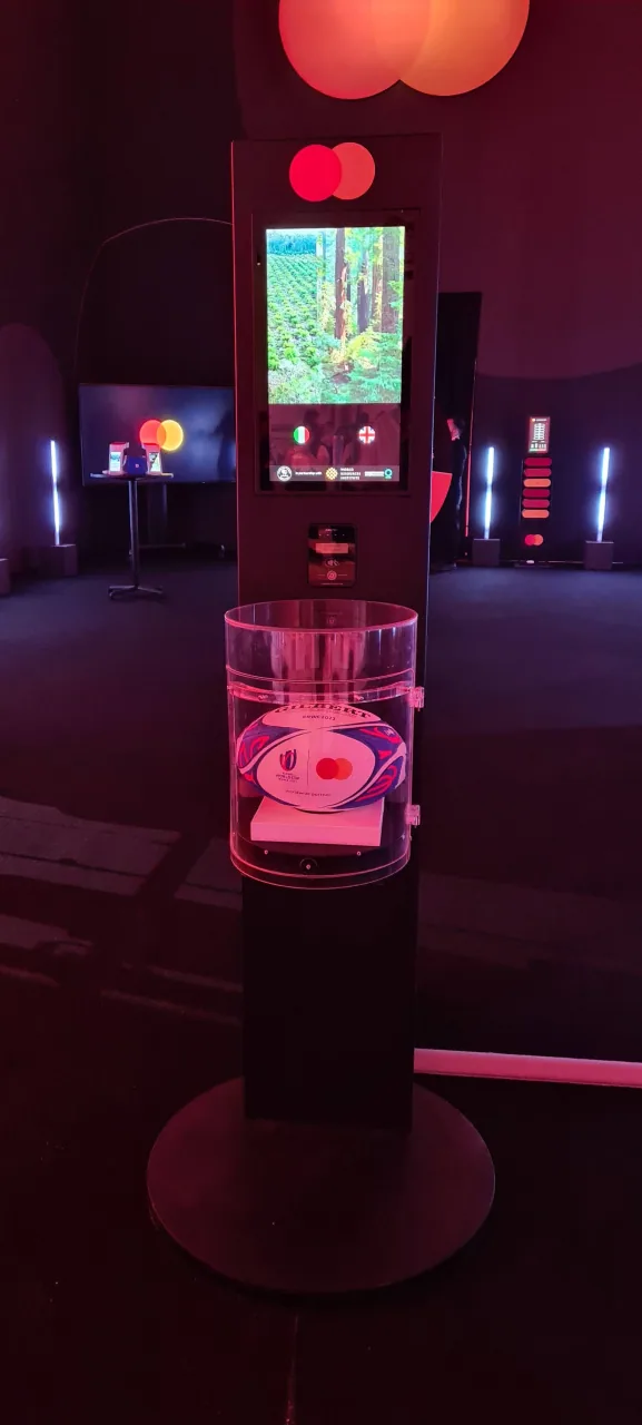 A totem in event lighting, running the interactive content.