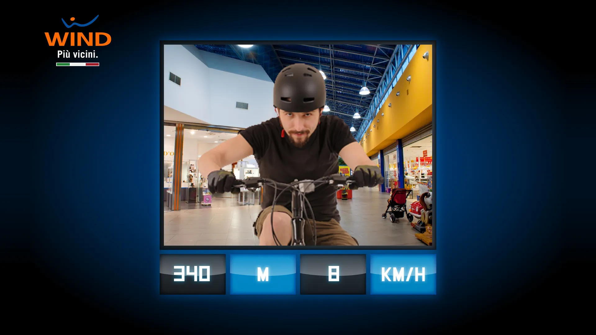 A rider photographed by the tablet mid-game, with distance and speed live.